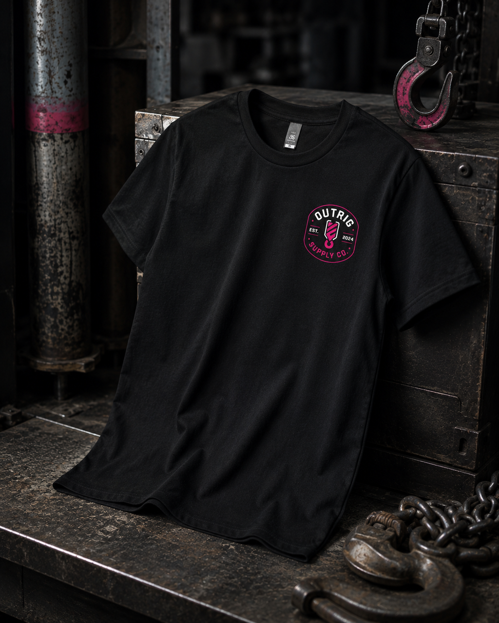 Black Outrig Women’s Heritage Badge Tee showing the branded design.